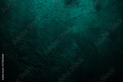 Deep emerald green texture or background with stains, waves and grain elements. Image with place for text. Template for design