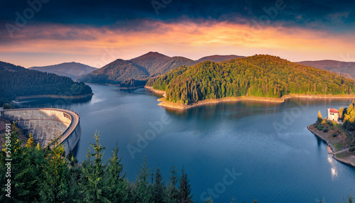 Fotografie Spectacular summer sunrise on Dragan lake
