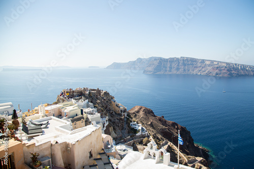 Domes, steeples, bells and white buildings of Santorini, Greece 