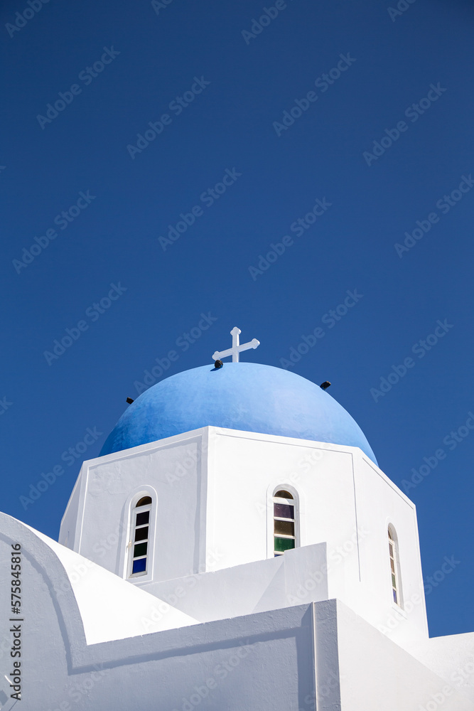 Domes, steeples, bells and white buildings of Santorini, Greece	