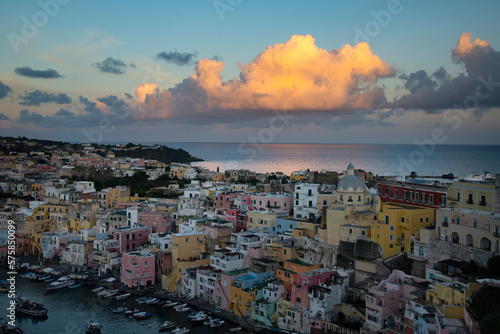 Beautiful fishing village in sunset, Marina Corricella on Procida Island, Bay of Naples, Italy.