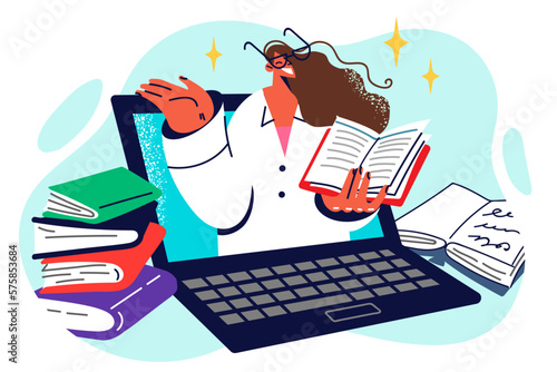 Woman in white coat peeks out laptop with book in hand for concept learning to become doctor