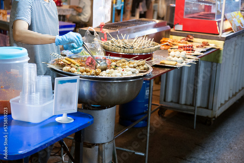 Photography grilled sausage on the grill in thai street food market.