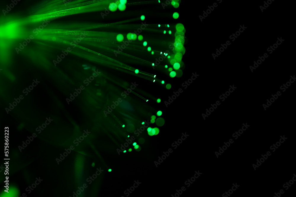 Color fiber optical background on black, Fiber optics lights abstract background, Closeup, fiber optics on defocused background. Color fiber optical background on black, Fiber optics lights abstract background, Closeup, fiber optics on defocused background.