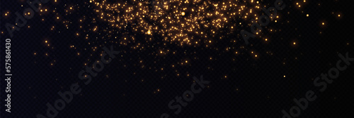 Golden glitter.Light effect.Glittering particles background. Gold dust on a transparent background.