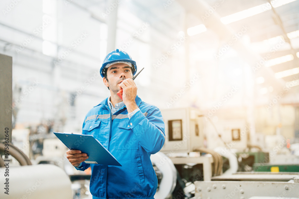 Professional Engineering of modern factory checking to automatic machinery. Engineering with clipboard Programmable Logic Controller to manage large machine working full automatic. Professional Engineering of modern factory checking to automatic machinery. Engineering with clipboard Programmable Logic Controller to manage large machine working full automatic.