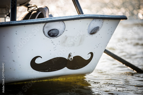 An Adipose drift boat with a mustache sticker while fly fishing in Montana. photo