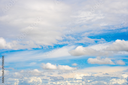Fototapeta Naklejka Na Ścianę i Meble -  clouds and blue sunny sky,  white clouds over blue sky, Aerial view,  nature blue sky white cleat weather.
