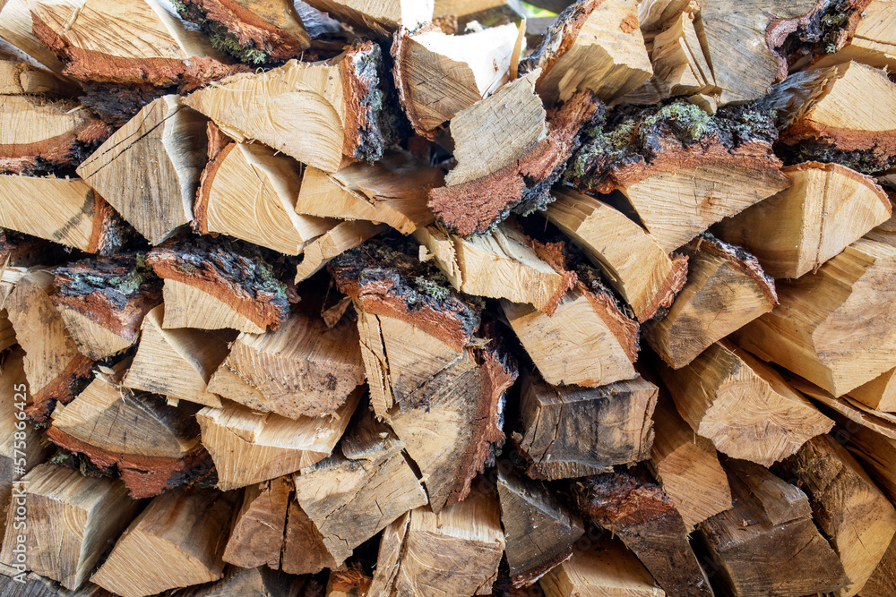 Natural texture of woodpile from coniferous trees. Pine firewood stacked. Natural texture of woodpile from coniferous trees. Pine firewood stacked.