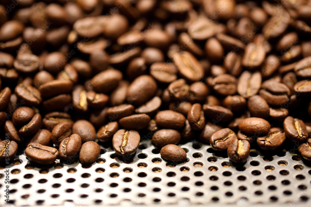Close up of lots of roasted coffee beans, Chelsea, Manhattan, New York City, USA Close up of lots of roasted coffee beans, Chelsea, Manhattan, New York City, USA