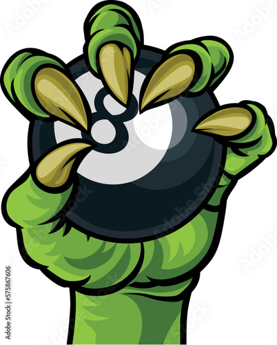 A monster or animal claw or talon hand with claws or talons holding a pool billiards black 8 ball.