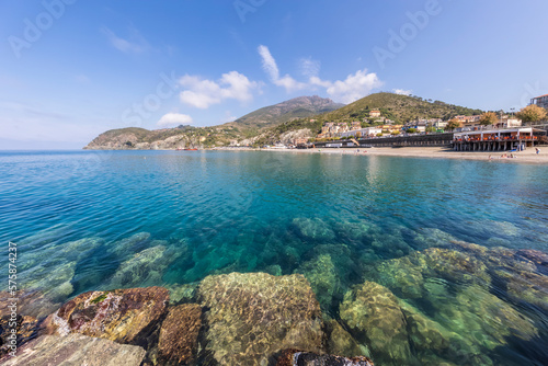 Italy, Liguria, Levanto, Seashore of Cinque Terre with Spiaggia Levanto beach and hills in background photo
