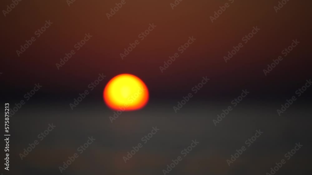 Sun Blurred golden sea at sunset. The sun reflects and sparkles on the waves of the bokeh, illuminating the golden sea. Holiday holiday concept. Abstract sea summer ocean sunset nature background. Sun Blurred golden sea at sunset. The sun reflects and sparkles on the waves of the bokeh, illuminating the golden sea. Holiday holiday concept. Abstract sea summer ocean sunset nature background.