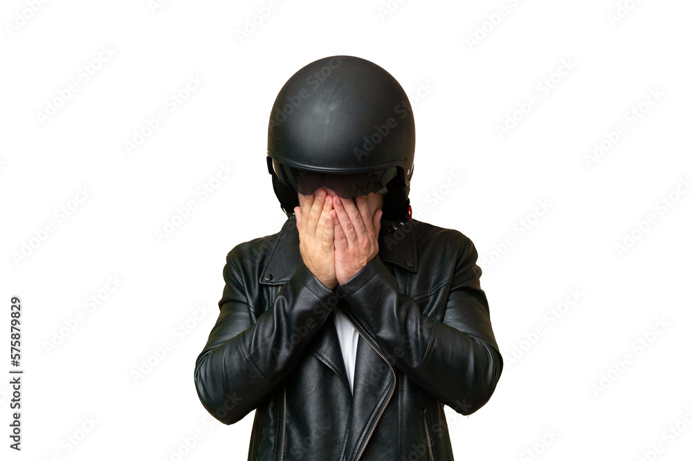 Young caucasian man with a motorcycle helmet isolated on green chroma background with tired and sick expression Young caucasian man with a motorcycle helmet isolated on green chroma background with tired and sick expression