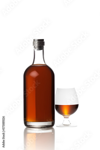 Cognac Bottle with glass isolated on white background