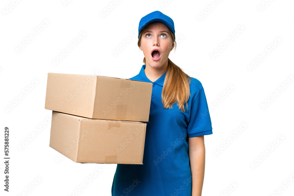 Delivery caucasian woman over isolated background looking up and with surprised expression Delivery caucasian woman over isolated background looking up and with surprised expression