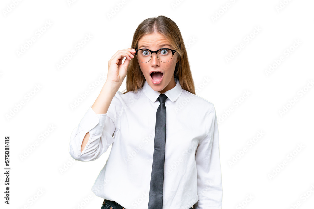 Young business caucasian woman over isolated background with glasses and surprised
