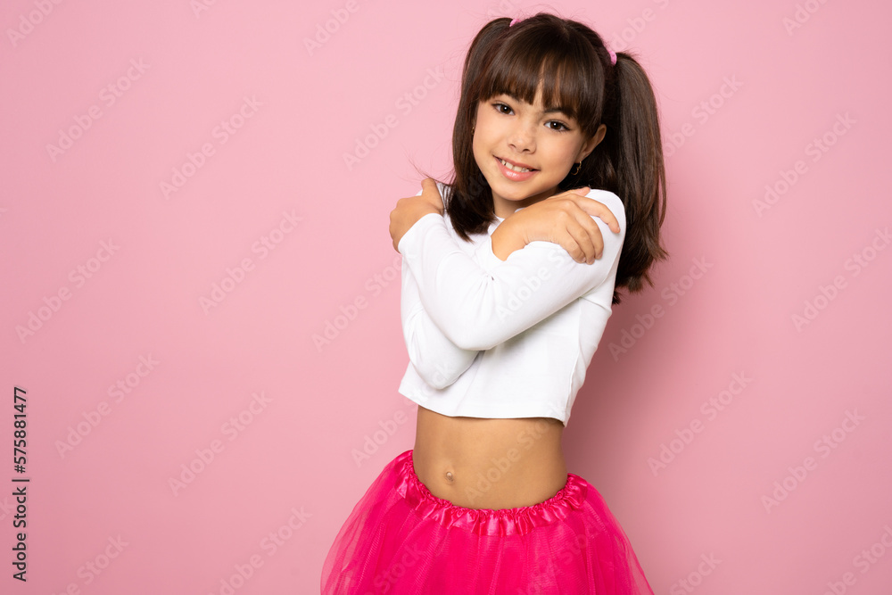 portrait image with smiling little brown-haired girl. Concept happy and