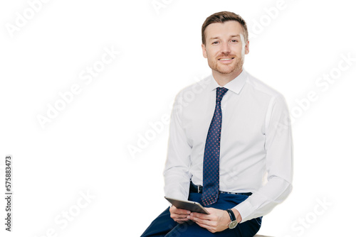 Fotografia Intelligent lawyer in elegant clothes, holds digital tablet, spends free time in