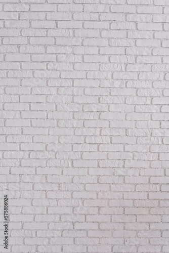 Abstract texture stained glass old plaster light gray and aged paint white brick wall background in room, blocks of masonry technology color vertical architecture wallpaper
