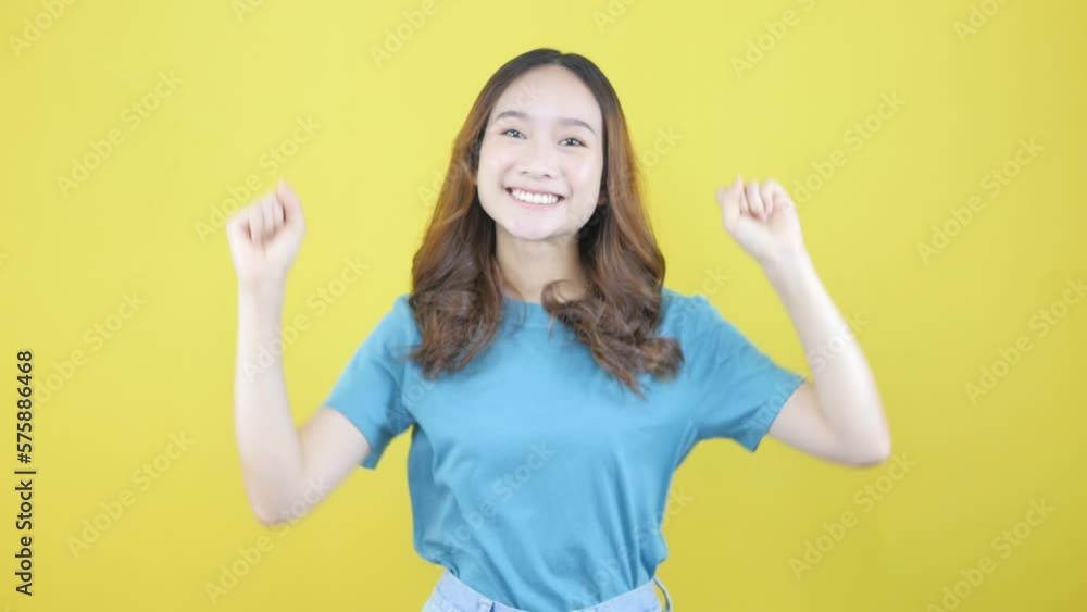 Enthusiastic Asian Woman Says Yes Looks Happy And Celebrates Victory Fist Pump Dance Champion Enthusiastic Asian Woman Says Yes Looks Happy And Celebrates Victory Fist Pump Dance Champion