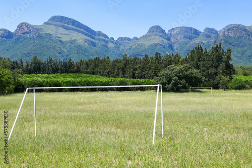 Football field with view at the mountains of Blyde river canyon in South Africa