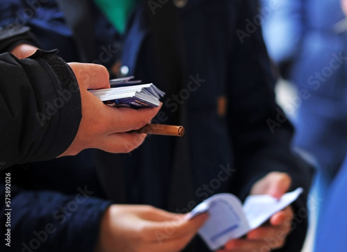 Children changing collectible soccer cards at school