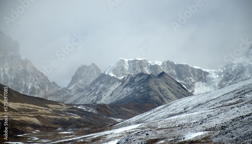 Lachung Sikkim India. Snow and glaciers cover. landscape photography. Snowy mountain range towers above base camp in the breathtaking Himalayas. View of windswept Himalayan Range photo
