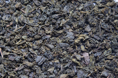 Green Tea background. Close-up shot of dry green tea