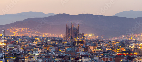 Aerial Panorama view of Barcelona city skyline and Sagrada familia at dusk time,Spain