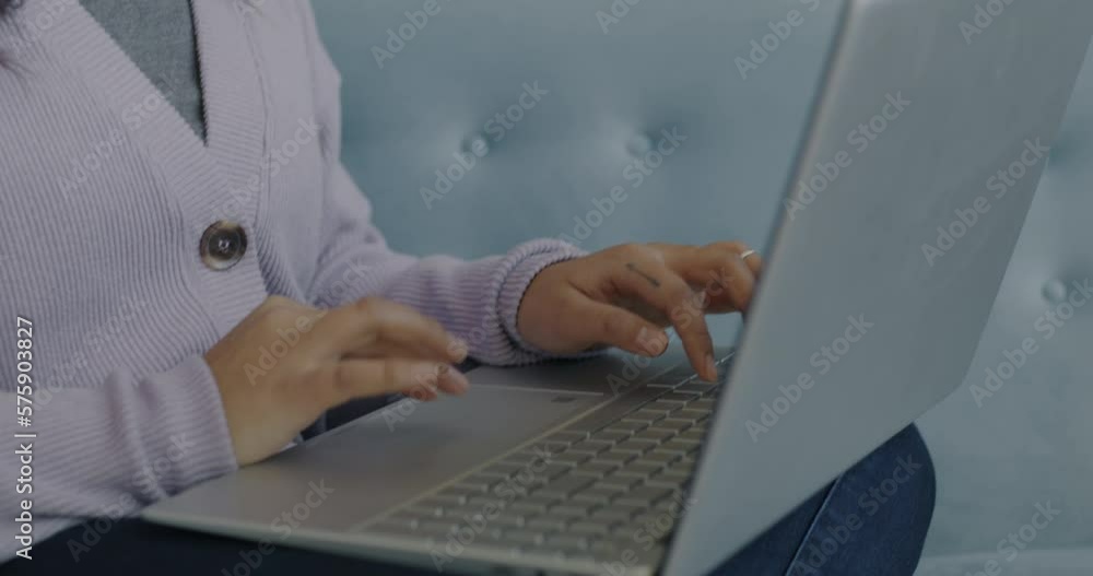 Cheerful young lady freelancer working with laptop from home typing and smiling enjoying remote job. Freelance work and wireless technology concept. Cheerful young lady freelancer working with laptop from home typing and smiling enjoying remote job. Freelance work and wireless technology concept.