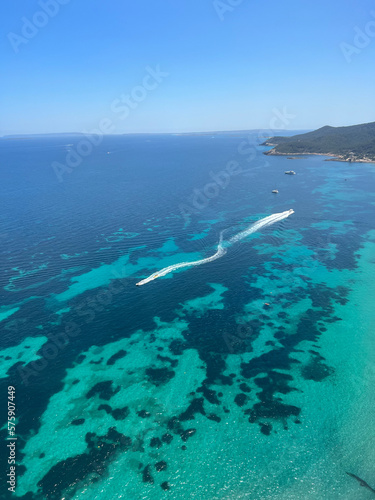 Fotografie Aerial Coastal Landscape of Ibiza with Crystal Clear Blue Mediterranean Water an