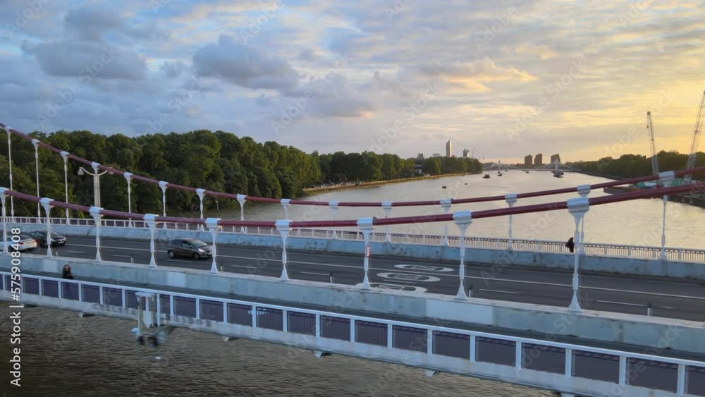Tracking vehicles on a bridge. Cars driving and people walking across river Tracking vehicles on a bridge. Cars driving and people walking across river