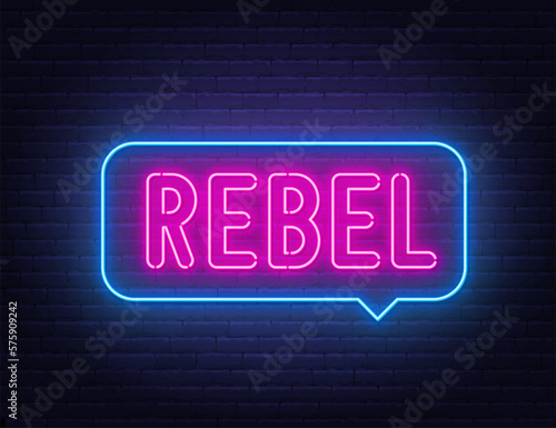 Rebel neon sign in the speech bubble on brick wall background.