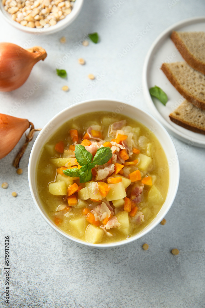 Homemade pea soup with smoked pork