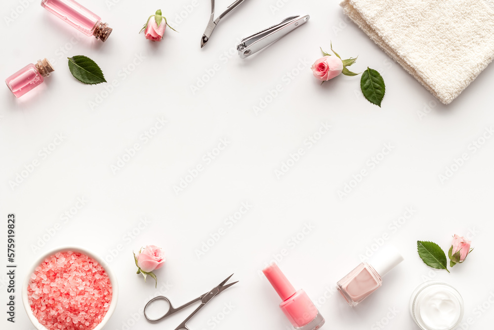 Manicure scissor and hands care cosmetics set with flowers. Manicure scissor and hands care cosmetics set with flowers.