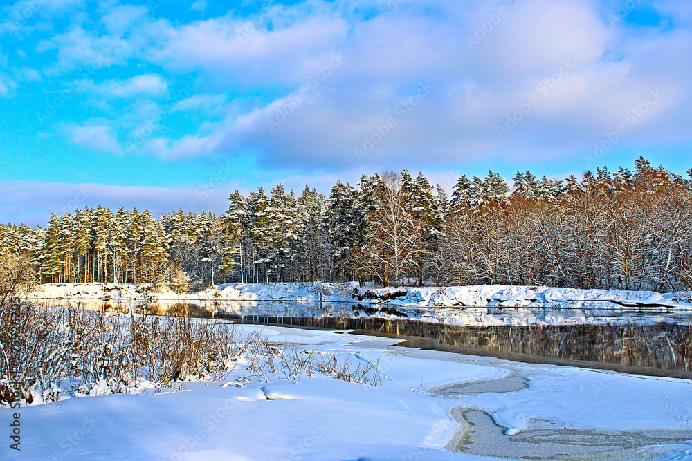 Winter landscape with forest and river