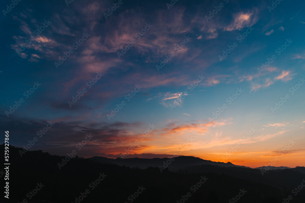 sun colouring the sky, horizontal closeup sun colouring the sky, horizontal closeup