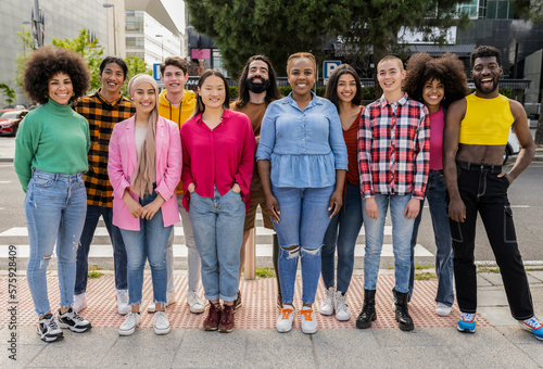 large group of diverse multiracial people smiling looking at camera