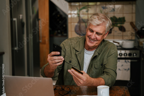 elderly male making online payment