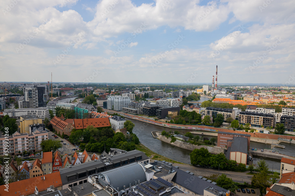 Top aerial view of Wroclaw. City center with colorful houses with red roofs and and river with a bridges. Poland