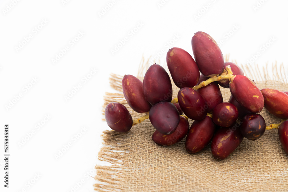 Raw dates palm dates isolated on white background. Raw dates palm dates isolated on white background.