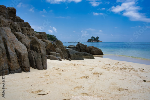 Beautiful white sandy beach with granite rock of Anse Royale beach
