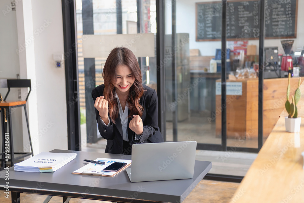 Marketing, Financial, Accounting, Planning, Businesswoman expressing joy that the company has profited from her team work.