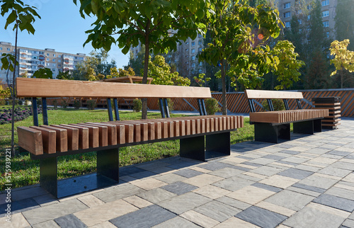 Stampa su tela Wooden benches in the public park