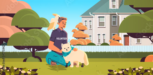 young man volunteer with parrot and cat animals walking outdoor generation Z lifestyle concept