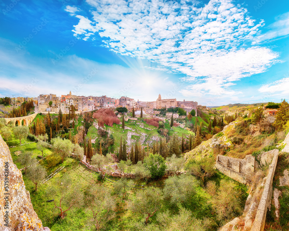 Breathtaking view on Gravina in Puglia ancient town, bridge and canyon at sunris