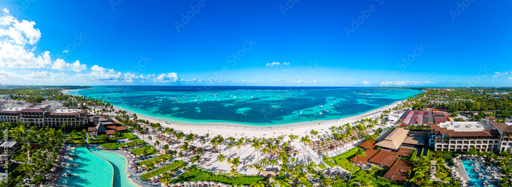 Aerial panorama of the all inclusive resort Lopesan beach with white sand and turquoise water of the Caribbean Sea. Best destination for vacation in Punta Cana