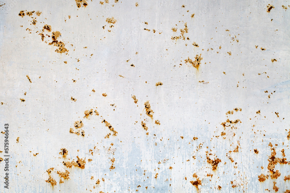 Old peeling bluish paint on rusted iron surface with corrosion spots Old peeling bluish paint on rusted iron surface with corrosion spots