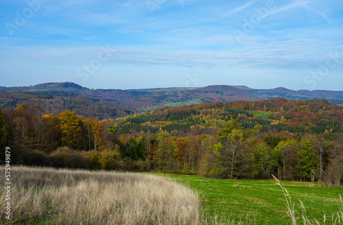 View of nature and the Rh  n near Riedenberg. Autumn forest in the low mountain range. 